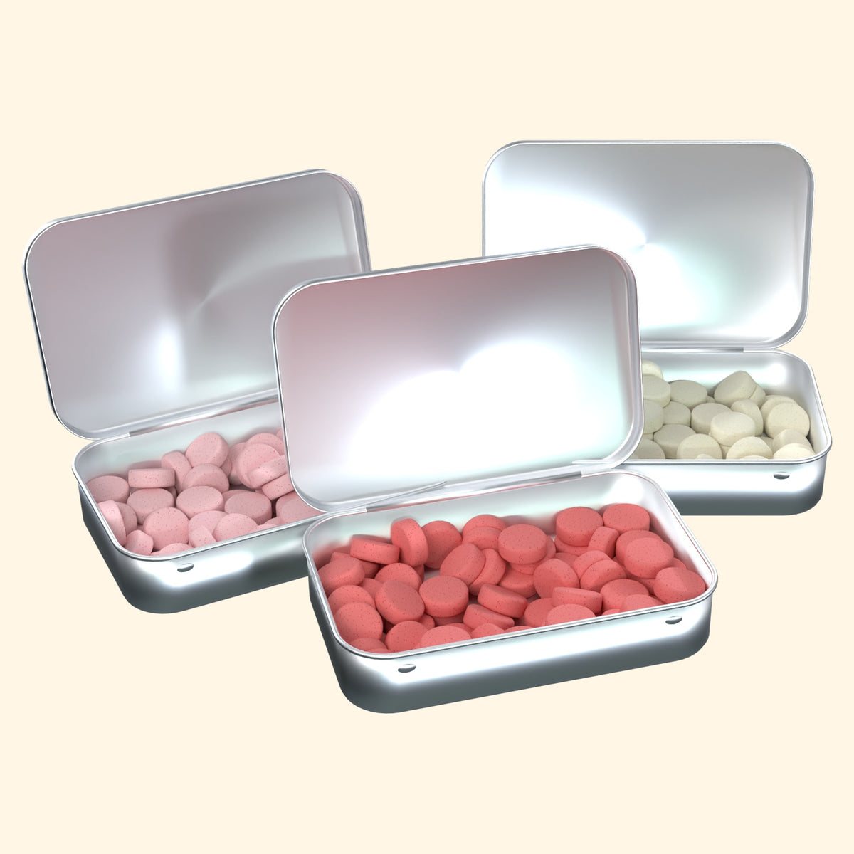 Three open tins of caffeinated mints: strawberry, watermelon and pineapple